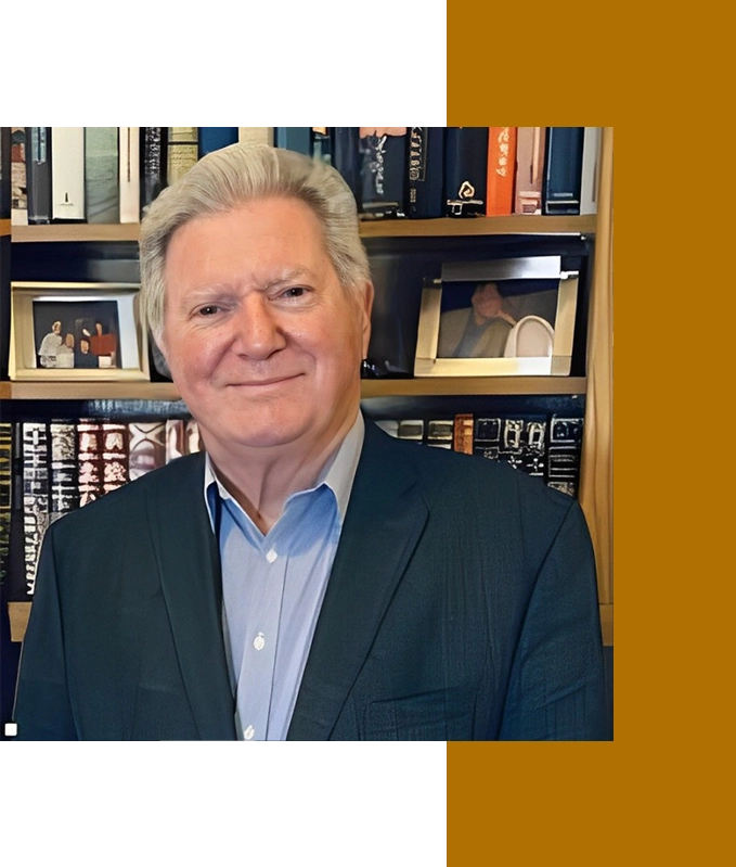 A man in a suit stands before a bookshelf filled with books and framed photos, perhaps delving into the mysteries of hypnotherapy.